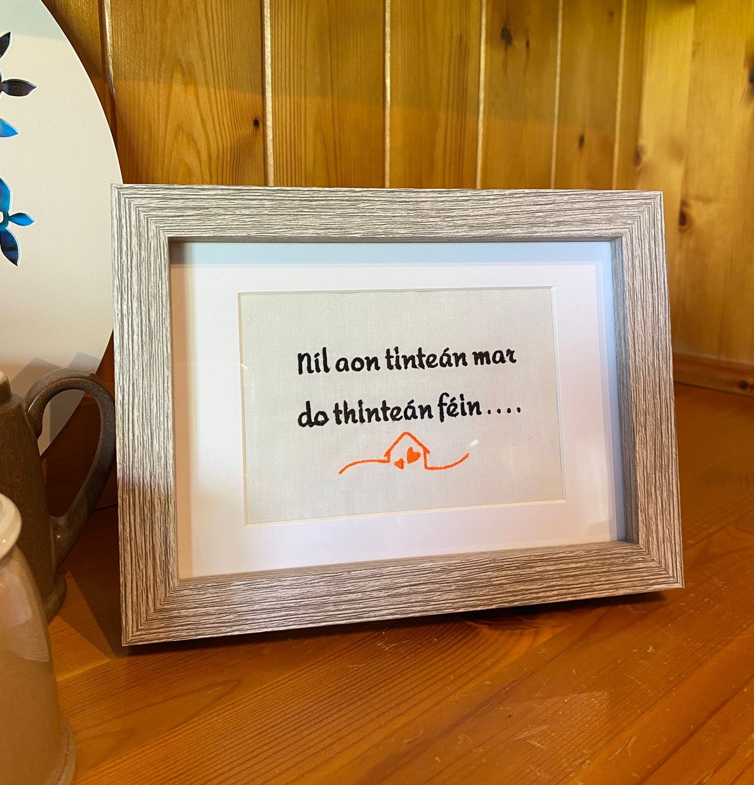 Níl aon tinteán mar do thinteán féin....